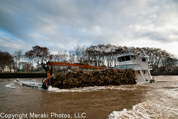 Photo of boat carring timber