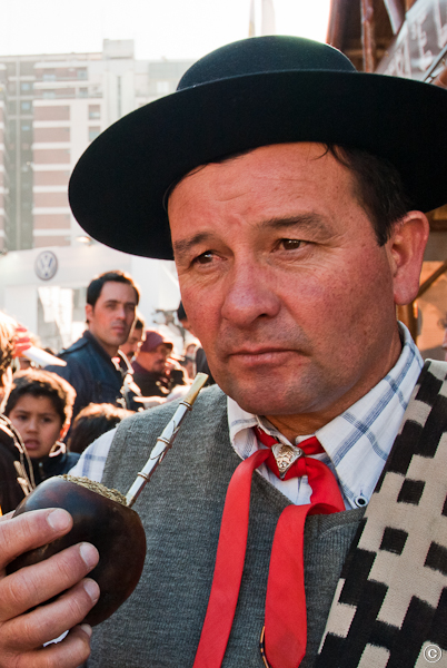 Photo of man sipping mate