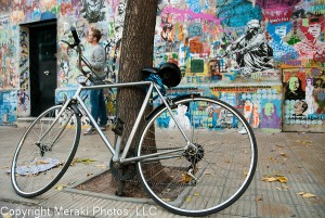 Photos of bike against graffiti wall