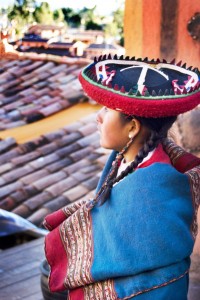 We took this shot just after a traditional weaving demonstration in Cusco. The high elevation in the Peruvian Andes makes the air dry and temperatures cool during there mild winters. It can get quite cold at night as this girl bundles up before sundown.