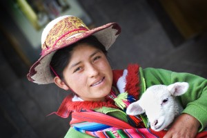 On the streets of Cusco you can find many children and their parents posing in traditional dress for tourists. We wish we could say this shot was taken in a remote village but it was in the heart of Cusco's central square (Plaza de Armas). Shhh, don't tell anyone.