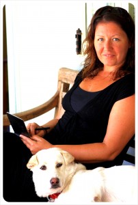 Co-author Jess with a puppy she took care of during a housesit.